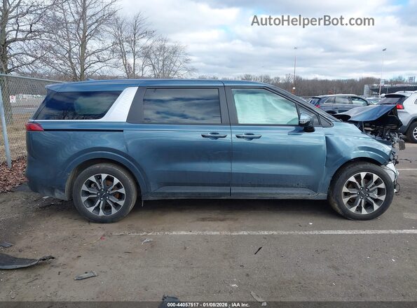 KNDNC5H34R6433579 2024 KIA CARNIVAL MPV Blue Widok wnętrza z tyłu