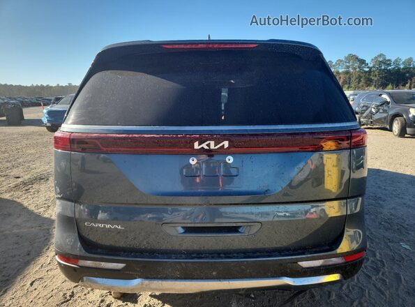 KNDNE5H35R6433522 2024 KIA CARNIVAL Black Rear view