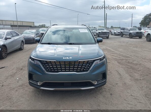 KNDNE5H36P6201573 2023 KIA CARNIVAL MPV Green Rear interior view