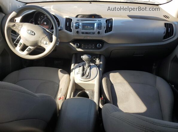 KNDPB3AC7G7798808 2016 KIA SPORTAGE Серебряный Вид панели приборов
