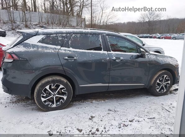 KNDPVCDGXS7203853 2025 KIA SPORTAGE HYBRID Gray Widok wnętrza z tyłu