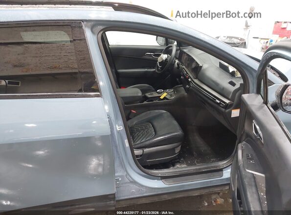 KNDPVDDG1T7278335 2026 KIA SPORTAGE HYBRID Blue Widok wnętrza z przodu