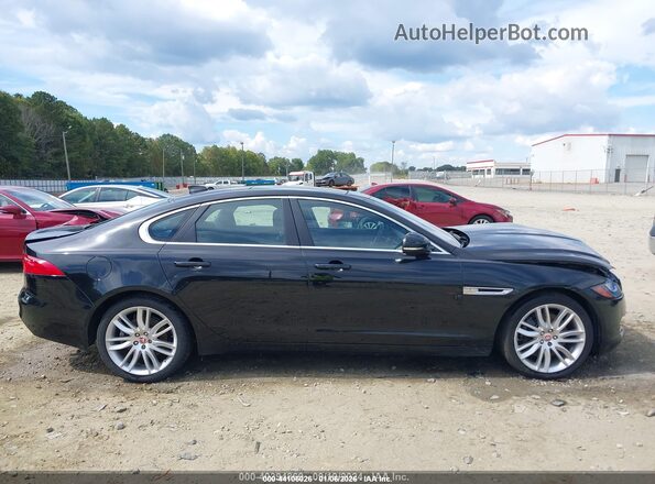 SAJBJ4BV6GCY19465 2016 JAGUAR XF Black Widok wnętrza z tyłu