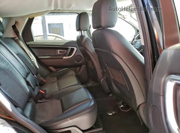 SALCP2BGXGH629915 2016 LAND ROVER DISCOVERY Black Widok wnętrza z tyłu
