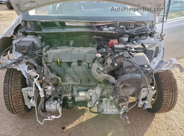 VNKJTUD35GA061928 2016 TOYOTA YARIS Silver Vista interior trasera