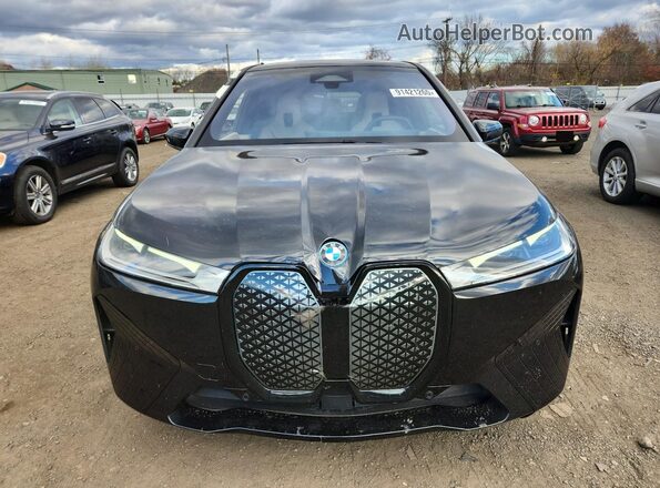 WB523CF00PCM73863 2023 BMW IX Black Front view
