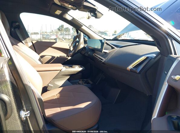 WB523CF03SCT07734 2025 BMW IX Black Front interior view
