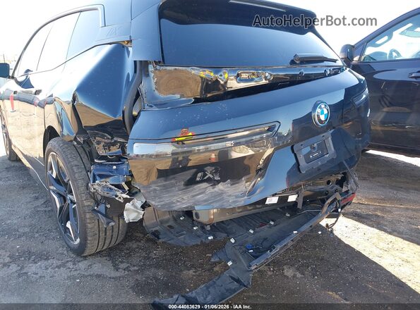 WB523CF03SCT07734 2025 BMW IX Black Front view