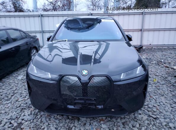 WB543CF01TCV00474 2026 BMW IX Черный Вид спереди