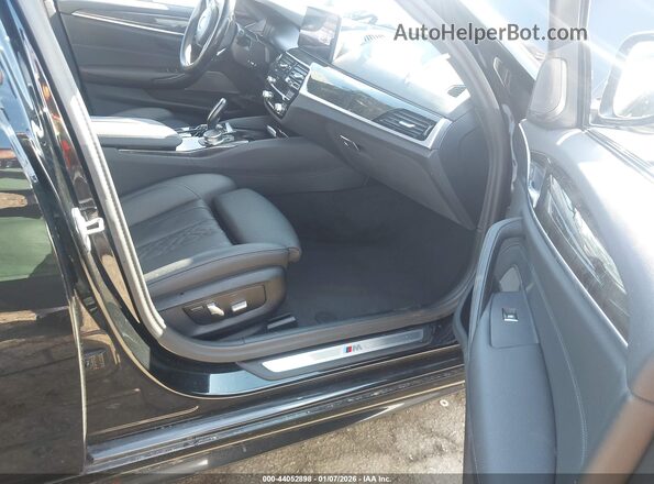 WBA13AG02PCM76537 2023 BMW 7 SERIES Black Front interior view