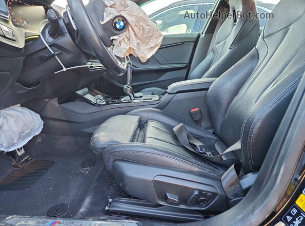 WBA13AL06L7G21803 2020 BMW M2 Black Front interior view