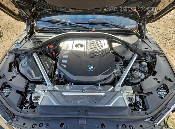 WBA13AR08MCF79635 2021 BMW M4 Black Вид задньої частини салону