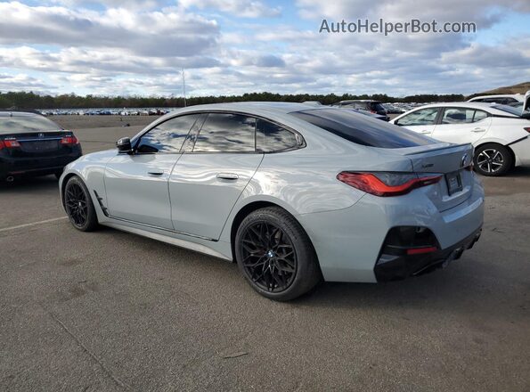 WBA13AW01NFN03059 2022 BMW M4 Silver Trasero izquierdo
