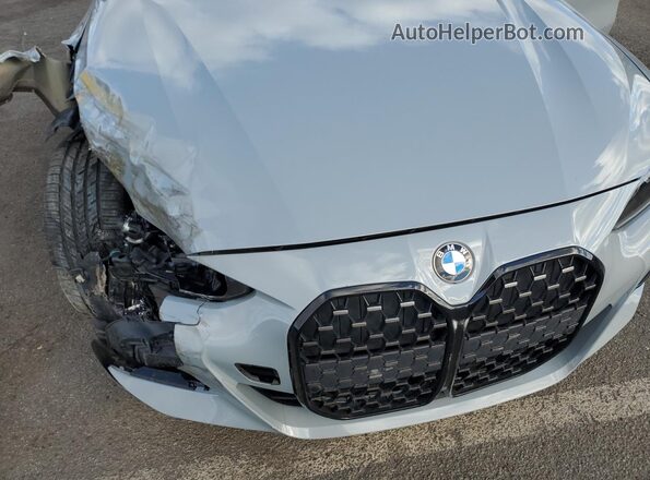 WBA13AW01NFN03059 2022 BMW M4 Silver Vista interior trasera