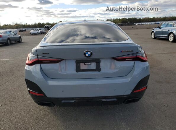 WBA13AW01NFN03059 2022 BMW M4 Silver Vista trasera