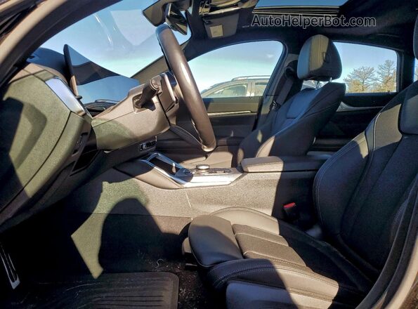 WBA13AW06RFT28197 2024 BMW M4 Black Front interior view