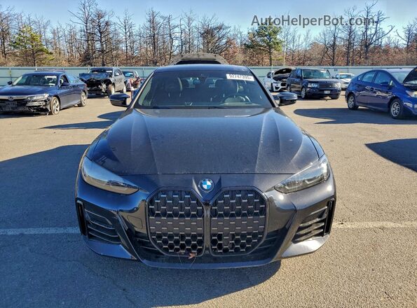 WBA13AW06RFT28197 2024 BMW M4 Black Front view