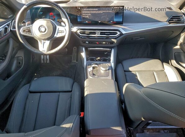 WBA13AW06RFT28197 2024 BMW M4 Black Dashboard view