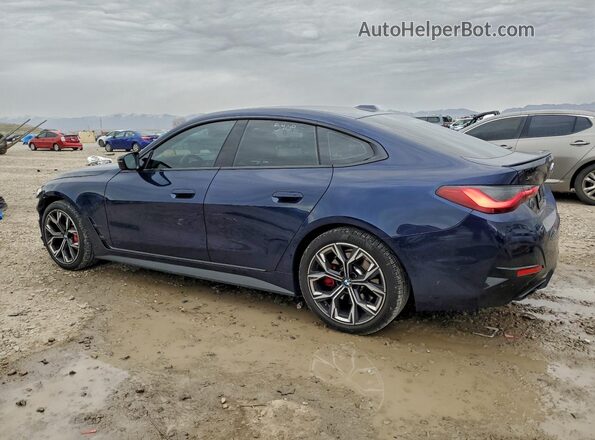 WBA13AW07NFM66194 2022 BMW M4 Blue Trasero izquierdo