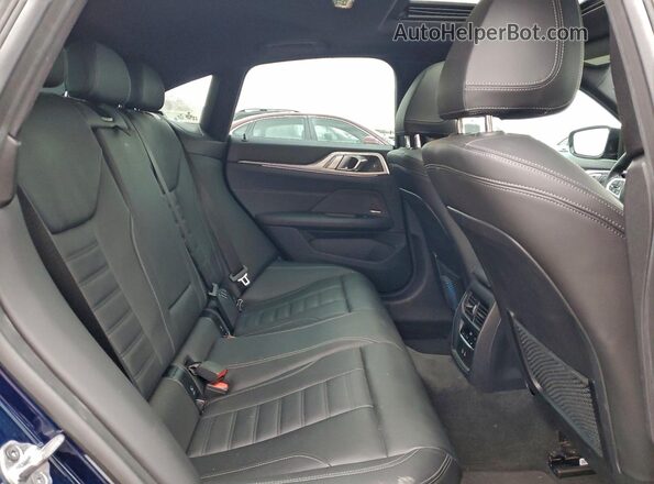 WBA13AW07NFM66194 2022 BMW M4 Blue Vista de los asientos traseros