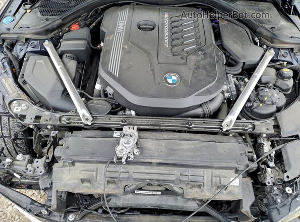 WBA13AW07NFM66194 2022 BMW M4 Blue Vista interior trasera