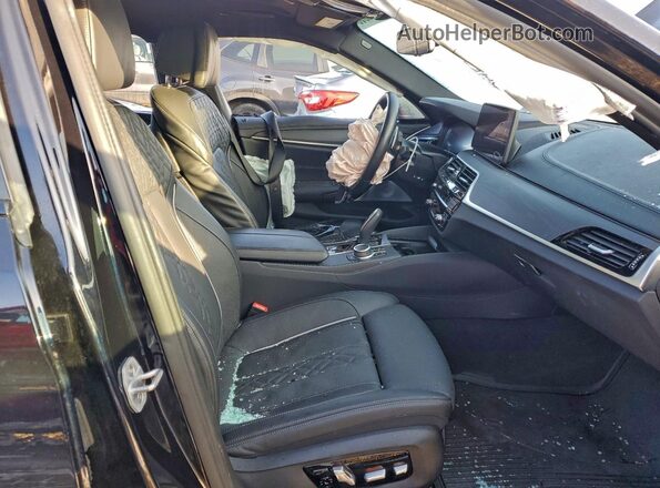 WBA13BK07NCJ99443 2022 BMW M5 Черный Вид салона спереди