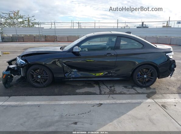 WBA2J5C57KVC07694 2019 BMW M2 Black Vista interior trasera