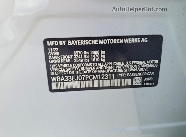 WBA33EJ07PCM12311 2023 BMW 7 SERIES White VIN კოდის სტიკერის ხედი