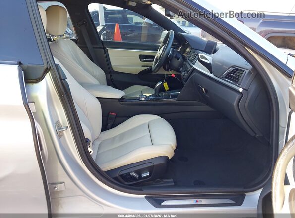 WBA4A9C53GGL87894 2016 BMW 4 SERIES Серебряный Вид салона спереди