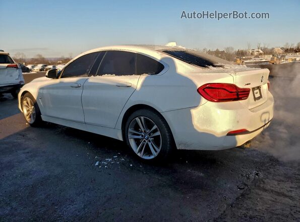WBA4J3C58KBL10389 2019 BMW OTHER White Tył lewy