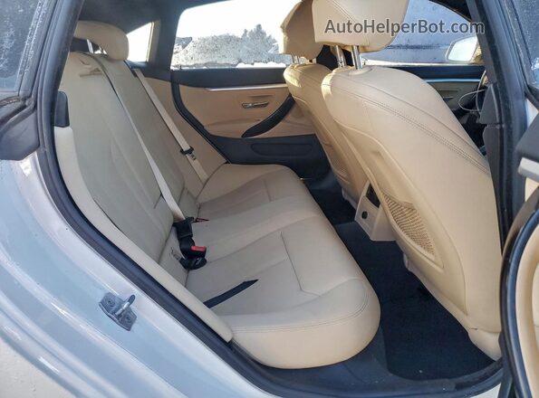 WBA4J3C58KBL10389 2019 BMW OTHER White Widok tylnych siedzeń