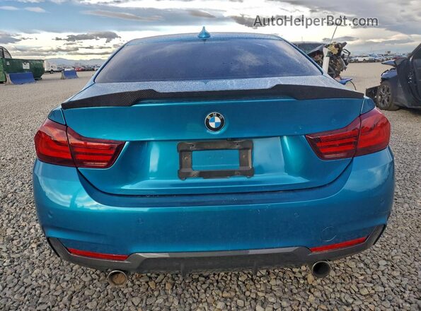 WBA4W9C08LFJ11233 2020 BMW 4 SERIES Turquoise Rear view