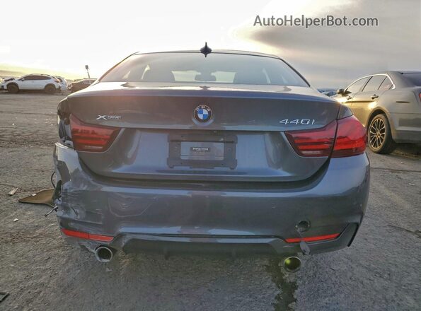 WBA4W9C09LFJ86670 2020 BMW 4 SERIES Gray Rear view