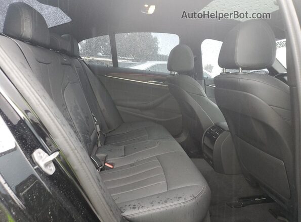 WBA53BH03PCM84331 2023 BMW 5 SERIES Black Rear seats view
