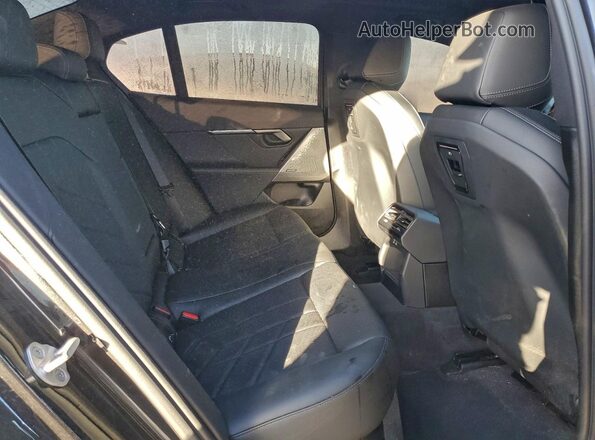 WBA53FJ08TCW02613 2026 BMW 5 SERIES Black Rear seats view