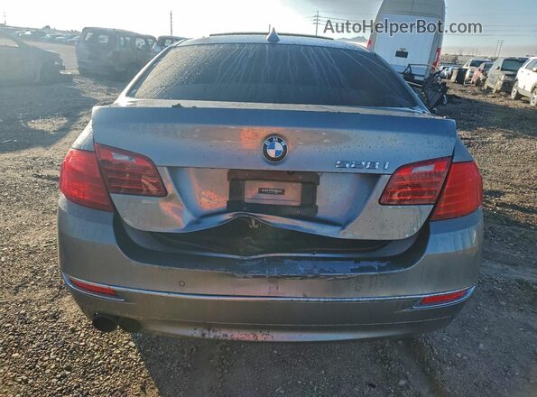 WBA5A5C54GG346980 2016 BMW 5 SERIES Gray Вид ззаду