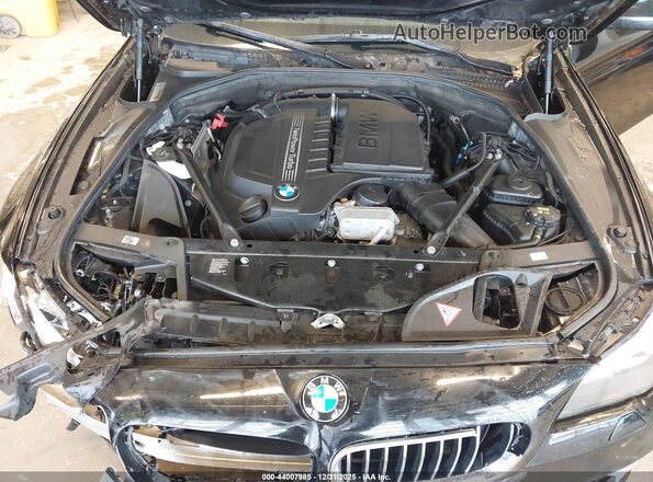 WBA5B3C57GD549560 2016 BMW 7 SERIES Black Rear view