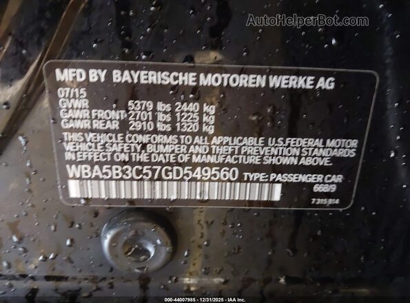 WBA5B3C57GD549560 2016 BMW 7 SERIES Black Engine compartment view