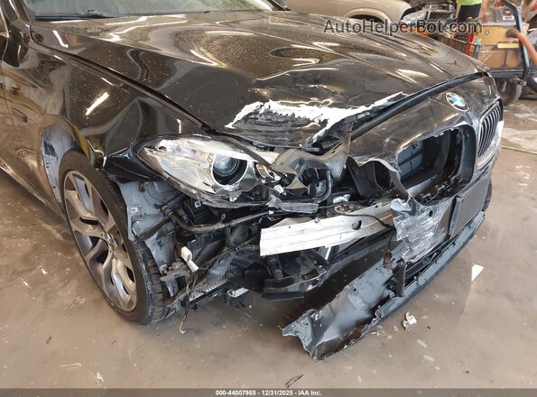 WBA5B3C57GD549560 2016 BMW 7 SERIES Black Front view