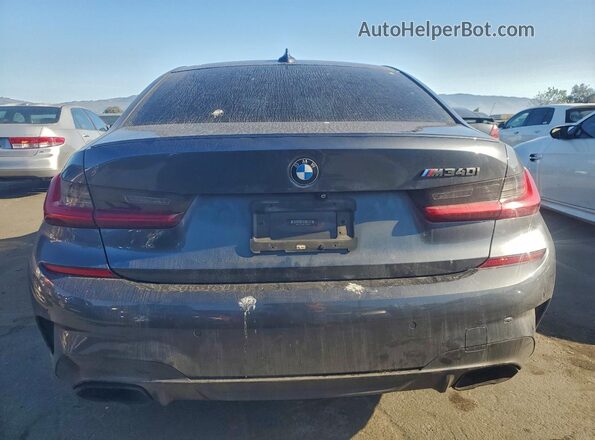 WBA5U7C06LFH12576 2020 BMW M3 Gray Rear view