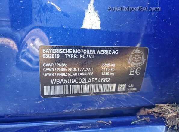 WBA5U9C02LAF54682 2020 BMW M3 Blue Engine compartment view