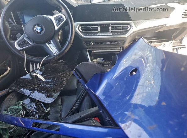WBA5U9C02LAF54682 2020 BMW M3 Blue Dashboard view