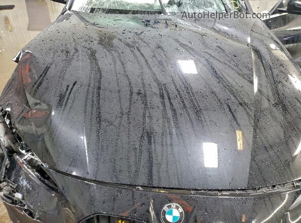 WBA63AV01NFM11019 2022 BMW 4 SERIES Black Вид задньої частини салону