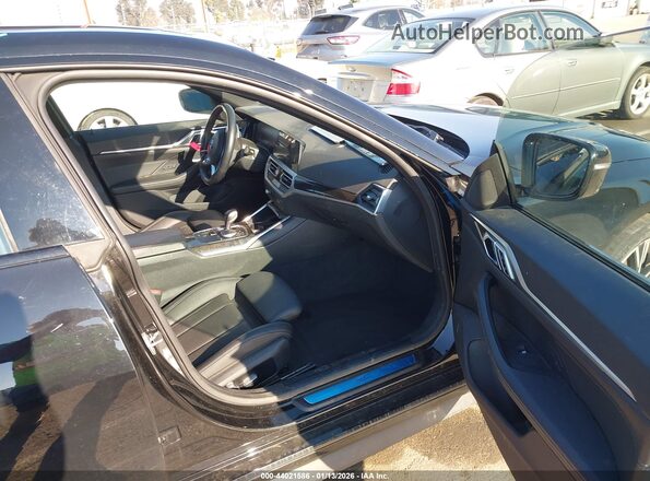 WBA63AV06PFP14235 2023 BMW 4 SERIES Черный Вид салона спереди