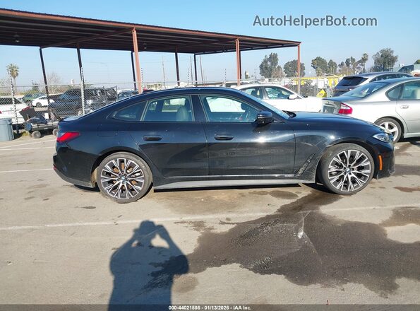 WBA63AV06PFP14235 2023 BMW 4 SERIES Черный Вид задней части салона