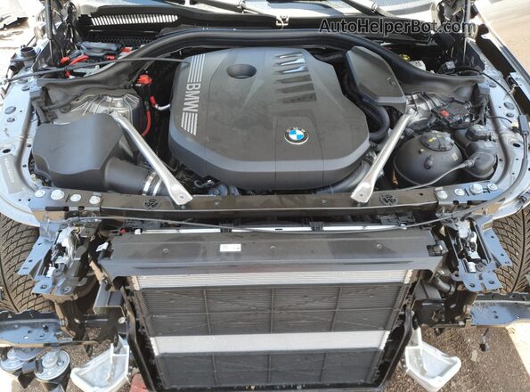 WBA63FJ06RCR12546 2024 BMW 5 SERIES Серый Вид задней части салона