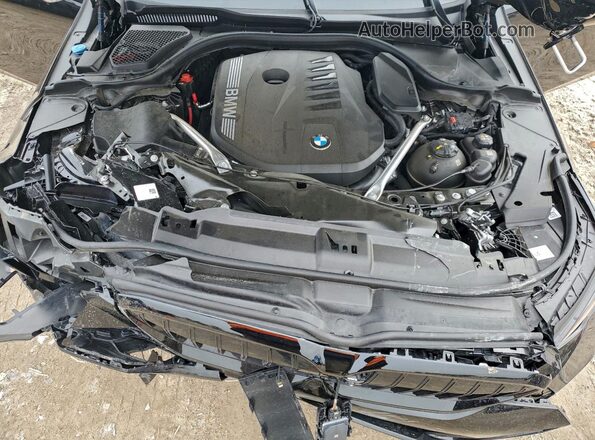 WBA63FJ07RCS17718 2024 BMW 5 SERIES Black Vista interior trasera