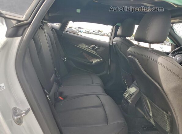 WBA73AK00L7F97896 2020 BMW 2 SERIES White Vista de los asientos traseros