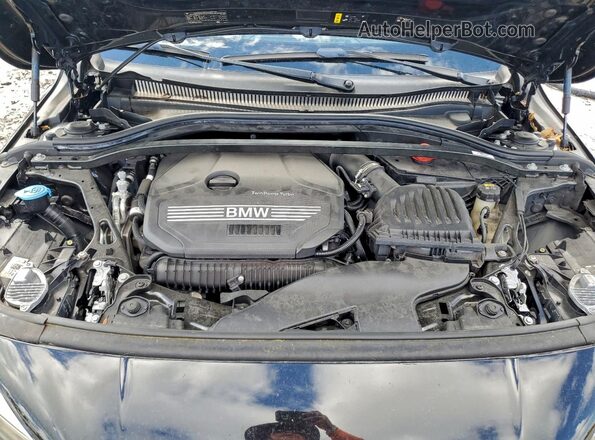 WBA73AK07M7H60075 2021 BMW 2 SERIES Black Vista interior trasera