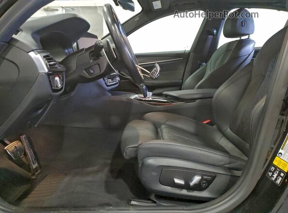 WBA73BJ06PCL24513 2023 BMW 5 SERIES Black Front interior view
